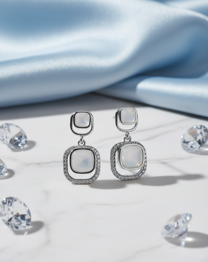 Silver shine zircon studs with durable plating and skin-friendly finish.